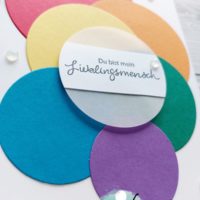 Karte mit Kreisen in Regenbogenfarben